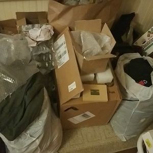 6 garbage bags full of mid tier designer clothes.